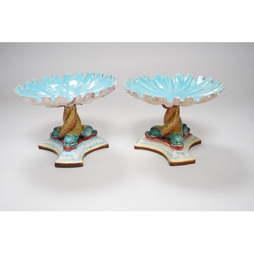 305 - A pair of late 19th century Royal Worcester majolica dolphin comports, 10cm tall