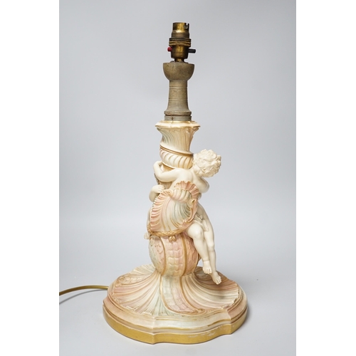 311 - A large Royal Worcester blush ivory cherub lamp base, 40cms not including light fitting