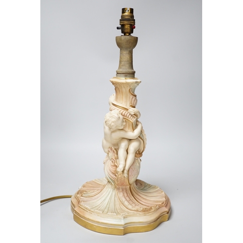 311 - A large Royal Worcester blush ivory cherub lamp base, 40cms not including light fitting