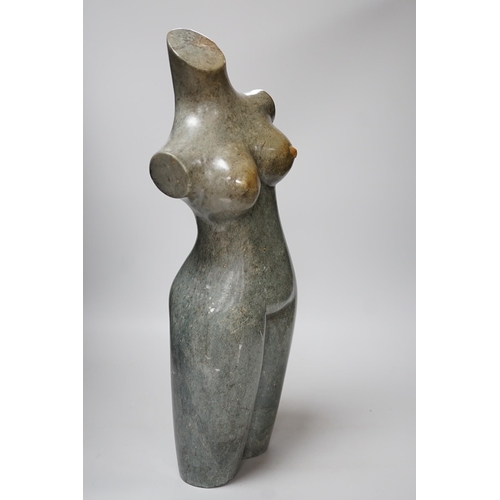 312 - Daniel Baradza (Zimbabwean). A large carved stone female torso, 52cms high