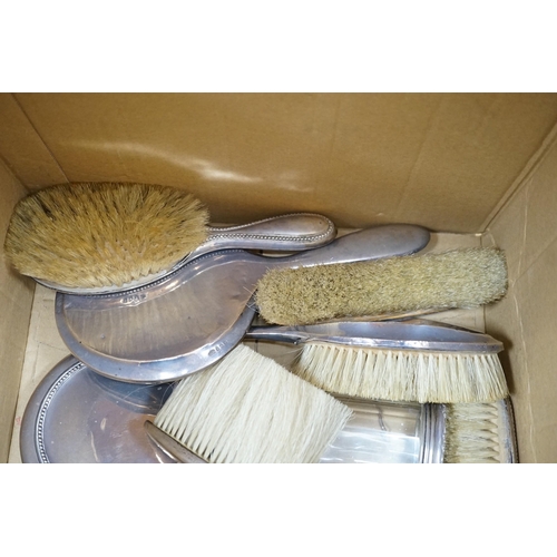 322 - A quantity of assorted silver mounted hand mirrors, brushes and toilet jars, various dates and maker... 