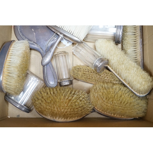 322 - A quantity of assorted silver mounted hand mirrors, brushes and toilet jars, various dates and maker... 