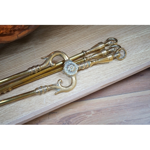 323 - A set of three Victorian brass fire irons, a pair of fire dogs and a copper log bin