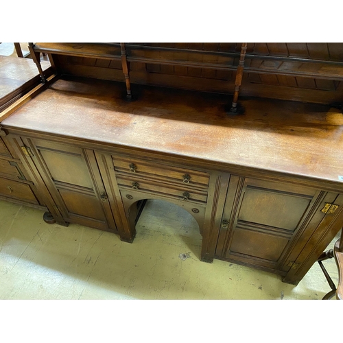 38 - A Victorian aesthetic movement mahogany sideboard, with Latin motto to the freize, width 168cm, dept... 