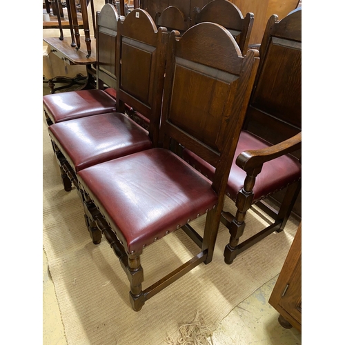 44 - A set of six 18th century style panelled oak dining chairs, two with arms