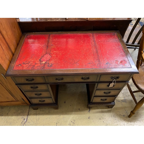 47 - A reproduction mahogany pedestal desk, width 100cm, depth 56cm, height 76cm