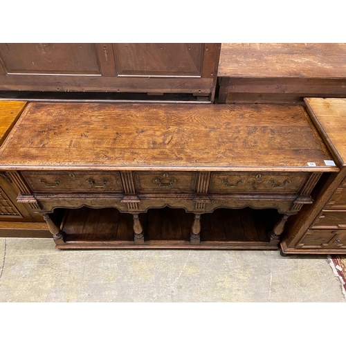 59 - An early 18th century style banded burr oak low pot-board dresser, width 152cm, depth 49cm, height 8... 