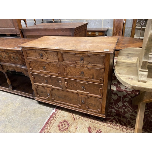 61 - A 18th century style geometric oak chest, width 104cm, depth 51cm, height 89cm