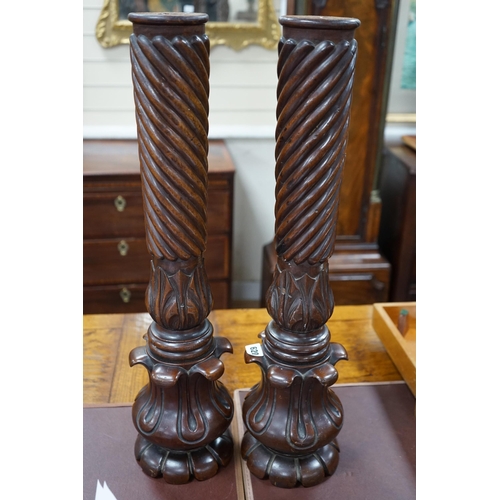 620 - A pair of William mahogany 'bedpost' candlestands