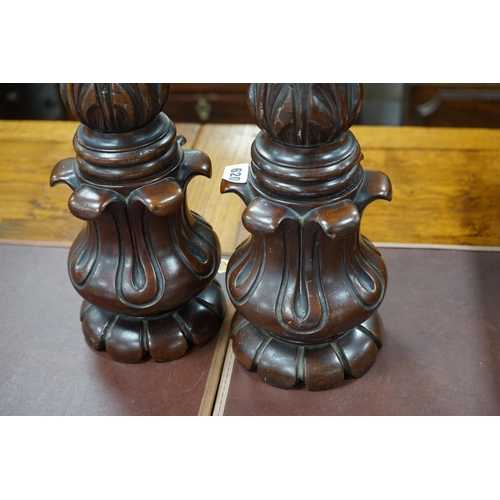 620 - A pair of William mahogany 'bedpost' candlestands