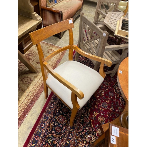 72 - A Biedermeier style circular breakfast table, diameter 91cm, height 75cm and a pair of elbow chairs... 