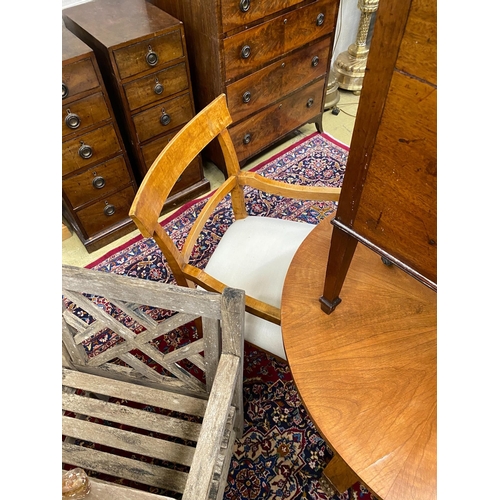 72 - A Biedermeier style circular breakfast table, diameter 91cm, height 75cm and a pair of elbow chairs... 