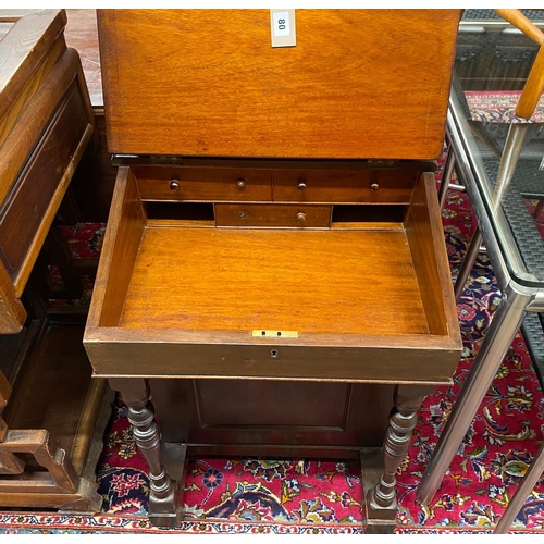 80 - A late Victorian mahogany davenport, width 52cm, depth 52cm, height 91cm