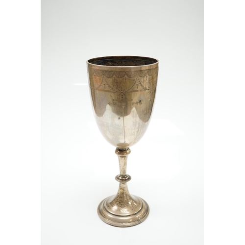 819 - A late Victorian engraved silver presentation goblet, possible Charles Boyton, London, 1890, 23cm, 7... 