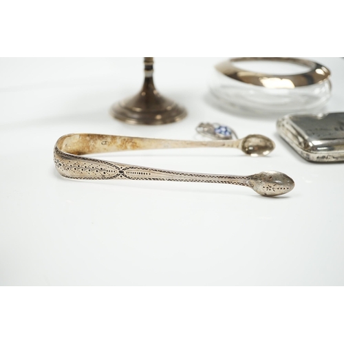 821 - A George V silver tazza, a silver cigarette case, a pair of George III silver sugar tongs, a silver ... 