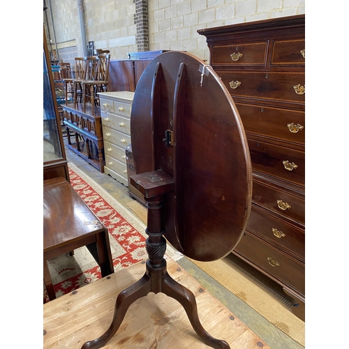 85 - A George III mahogany circular tilt top tripod tea table, diameter 78cm, height 72cm