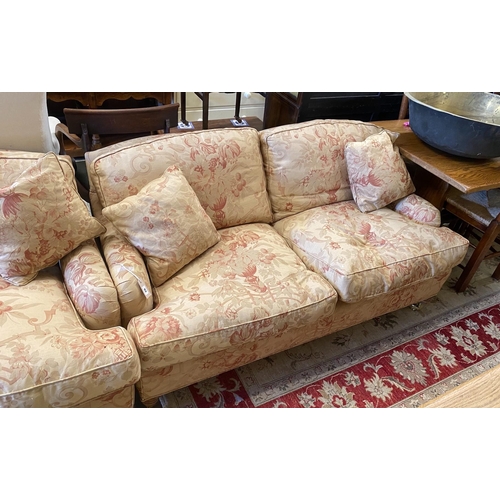 92 - A pair of John Sankey two seater settees with feather cushion seats and backs, length 156cm, depth 8... 