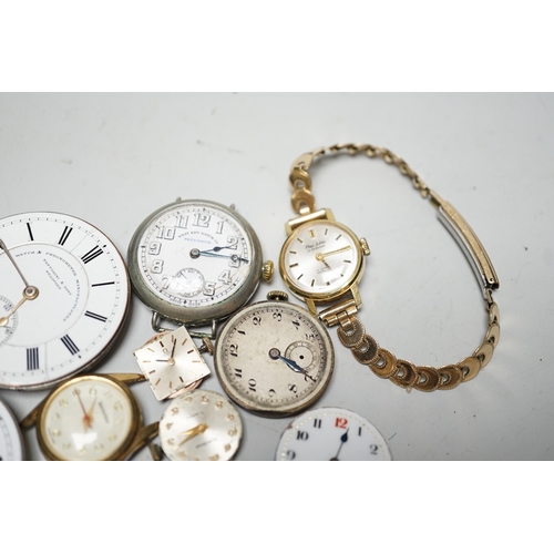 1990 - A collection of assorted wrist and pocket watch parts.