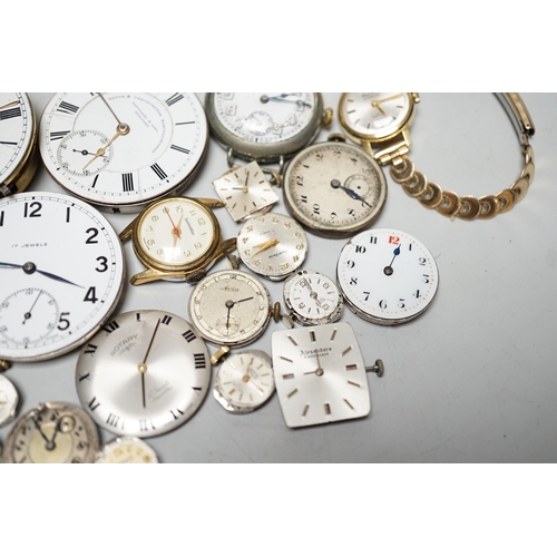 1990 - A collection of assorted wrist and pocket watch parts.