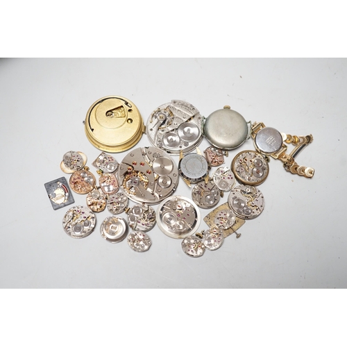 1990 - A collection of assorted wrist and pocket watch parts.