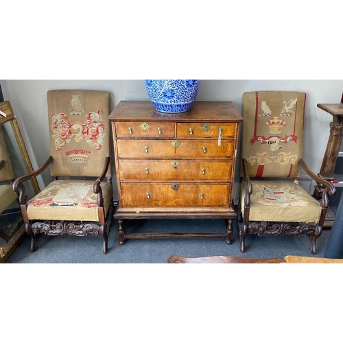 1003 - A pair of Carolean style walnut armchairs, width 61cm, depth 83cm, height 116cm