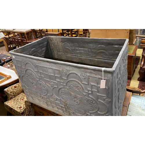 1031 - A fibre glass faux lead cistern, length 125cm, depth 72cm, height 75cm