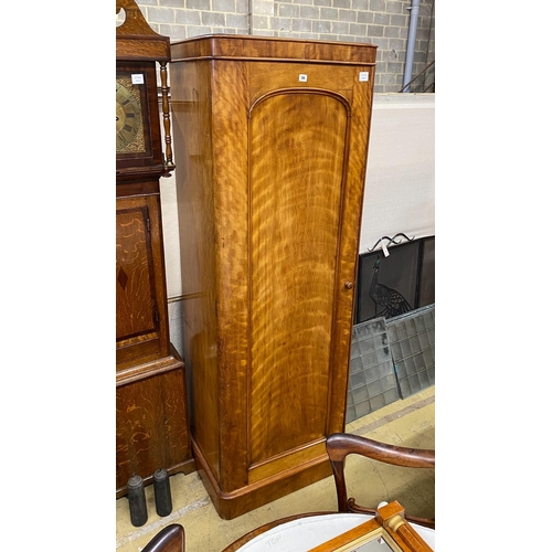 1056 - A Victorian satin birch single wardrobe, width 68cm, depth 50cm, height 200cm