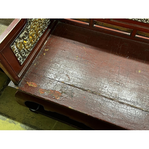 1068 - A Chinese scarlet lacquer parcel gilt bench, length 125cm, depth 70cm, height 97cm