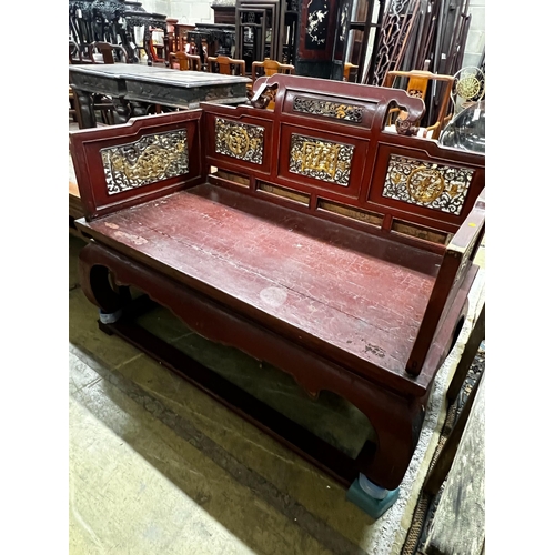 1068 - A Chinese scarlet lacquer parcel gilt bench, length 125cm, depth 70cm, height 97cm