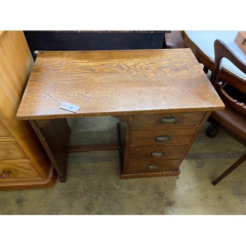 1072 - A small 1920's oak four drawer kneehole desk, length 81cm, depth 45cm, height 69cm