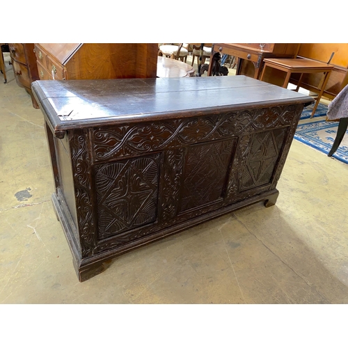 1089 - An 18th century and later carved oak coffer, with zinc liner, width 136cm, depth 56cm, height 76cm... 