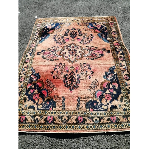 1129 - A North West Persian red ground rug, 210 x 150cm