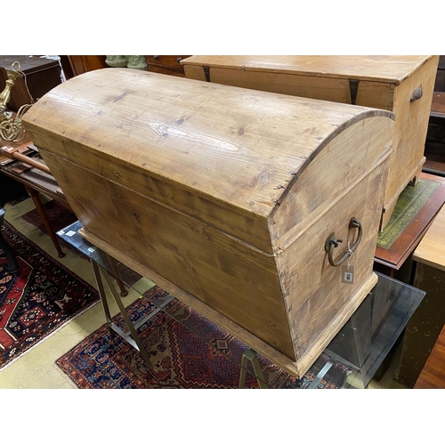 1146 - A 19th century continental pine domed top trunk, length 118cm, depth 63cm, height 70cm