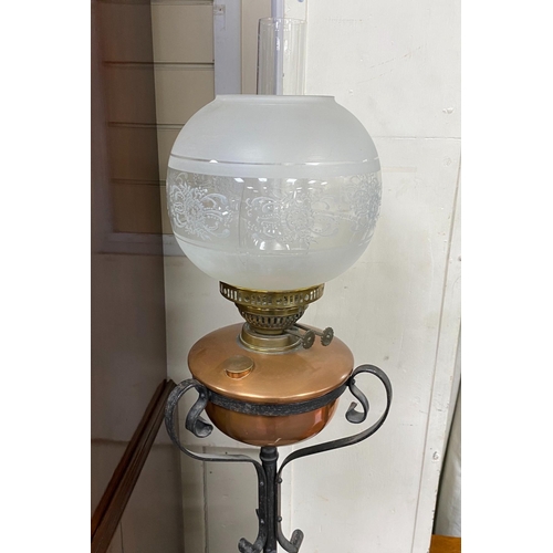 1177 - An Edwardian wrought iron and copper telescopic standard lamp with alabaster tier