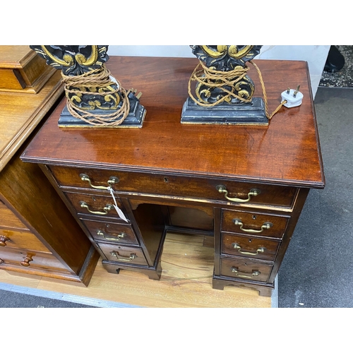 1180 - A George III style mahogany kneehole desk, width 73cm, depth 50cm, height 77cm