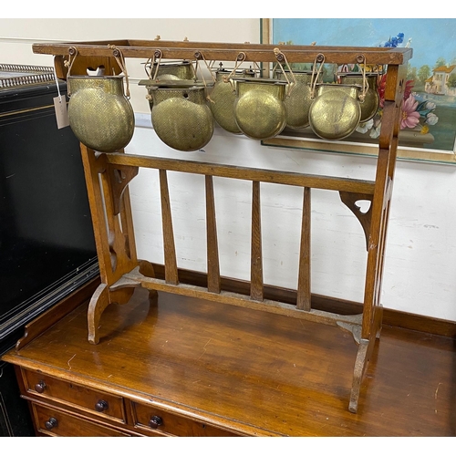 1186 - An Arts & Crafts oak and brass Glockenspiel by Plant and Percy, width 78cm, height 79cm