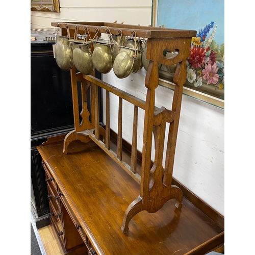 1186 - An Arts & Crafts oak and brass Glockenspiel by Plant and Percy, width 78cm, height 79cm