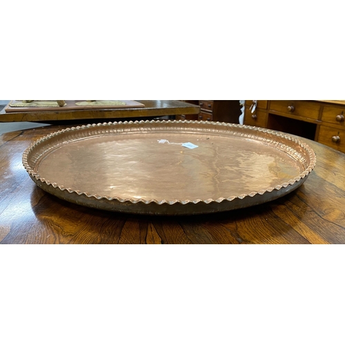 1198 - A large circular copper tray, diameter 74cm