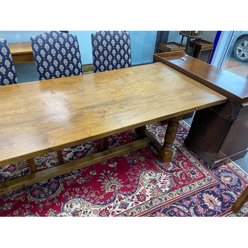 1201 - A large 18th century style rectangular oak refectory dining table, length 296cm, depth 89cm, height ... 