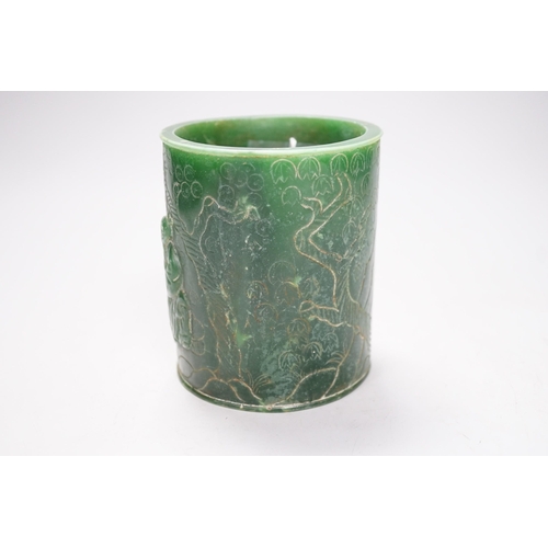 1266 - A Chinese incised green glass cylindrical brushpot, 11cm