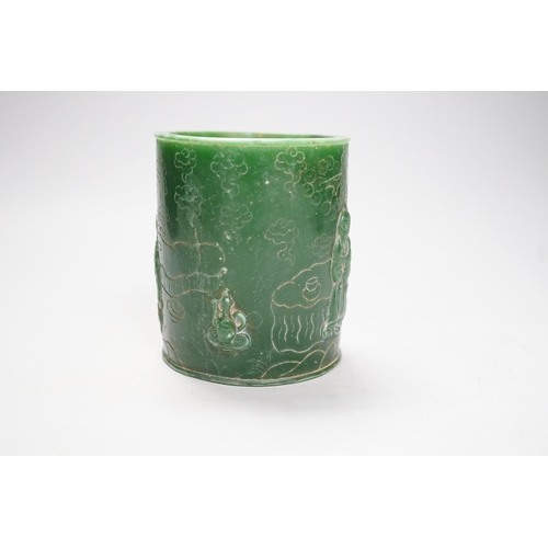 1266 - A Chinese incised green glass cylindrical brushpot, 11cm