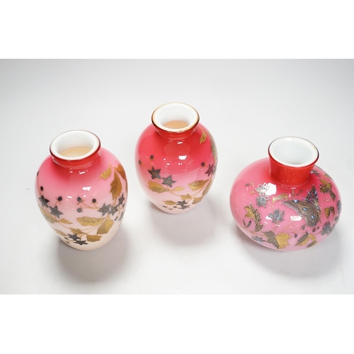 1269 - A pair of Stourbridge peach blow vases and another, tallest 13cm