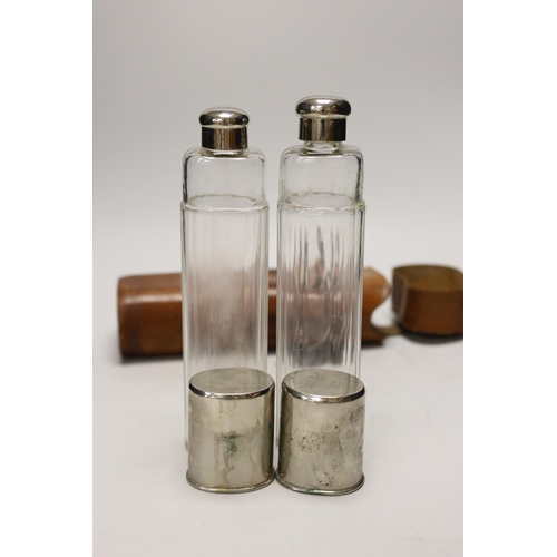 1287 - A late 19th/early 20th century leather duo travelling flask case by A. Greaves with two flasks... 