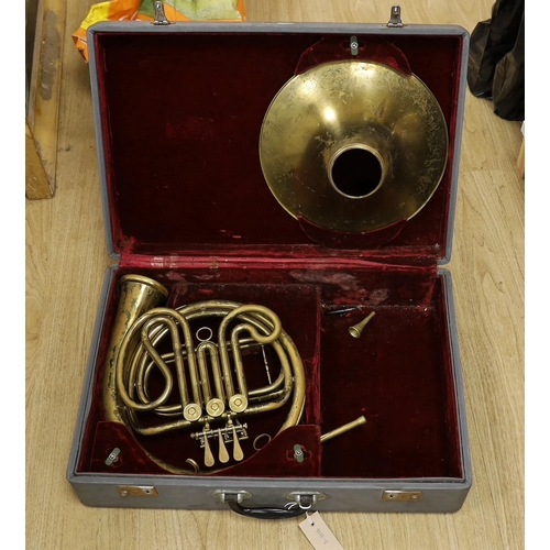 1325 - A trumpet and a French Horn ( both cased)