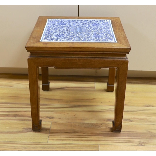 1331 - A Chinese hardwood and blue and white porcelain inset table, 42cm square