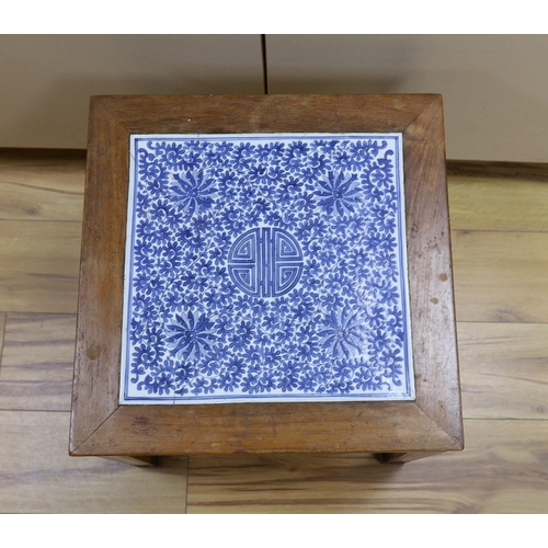 1331 - A Chinese hardwood and blue and white porcelain inset table, 42cm square