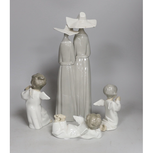 1339 - A selection of four assorted Lladro ceramic figures. Tallest 32.5cm