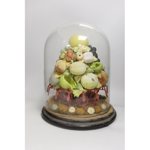 1357 - A Victorian wax fruit and woolwork arrangement under a glass dome, 36cm tall