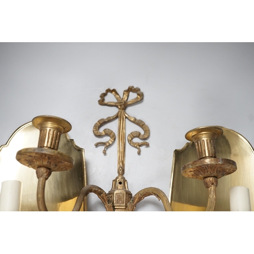 1381 - An 18th century style ribbon design brass two branch wall sconces and a pair of Dutch style brass wa... 