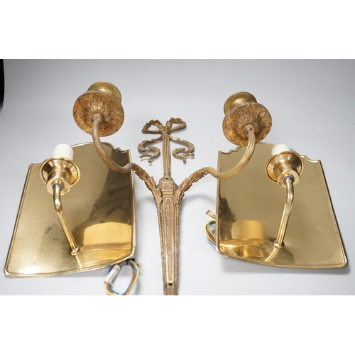 1381 - An 18th century style ribbon design brass two branch wall sconces and a pair of Dutch style brass wa... 